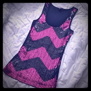 Express sexy black and hot pink sequin top